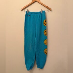 Aviator Nation Turquoise Sweatpants with Yellow Smiley Design
